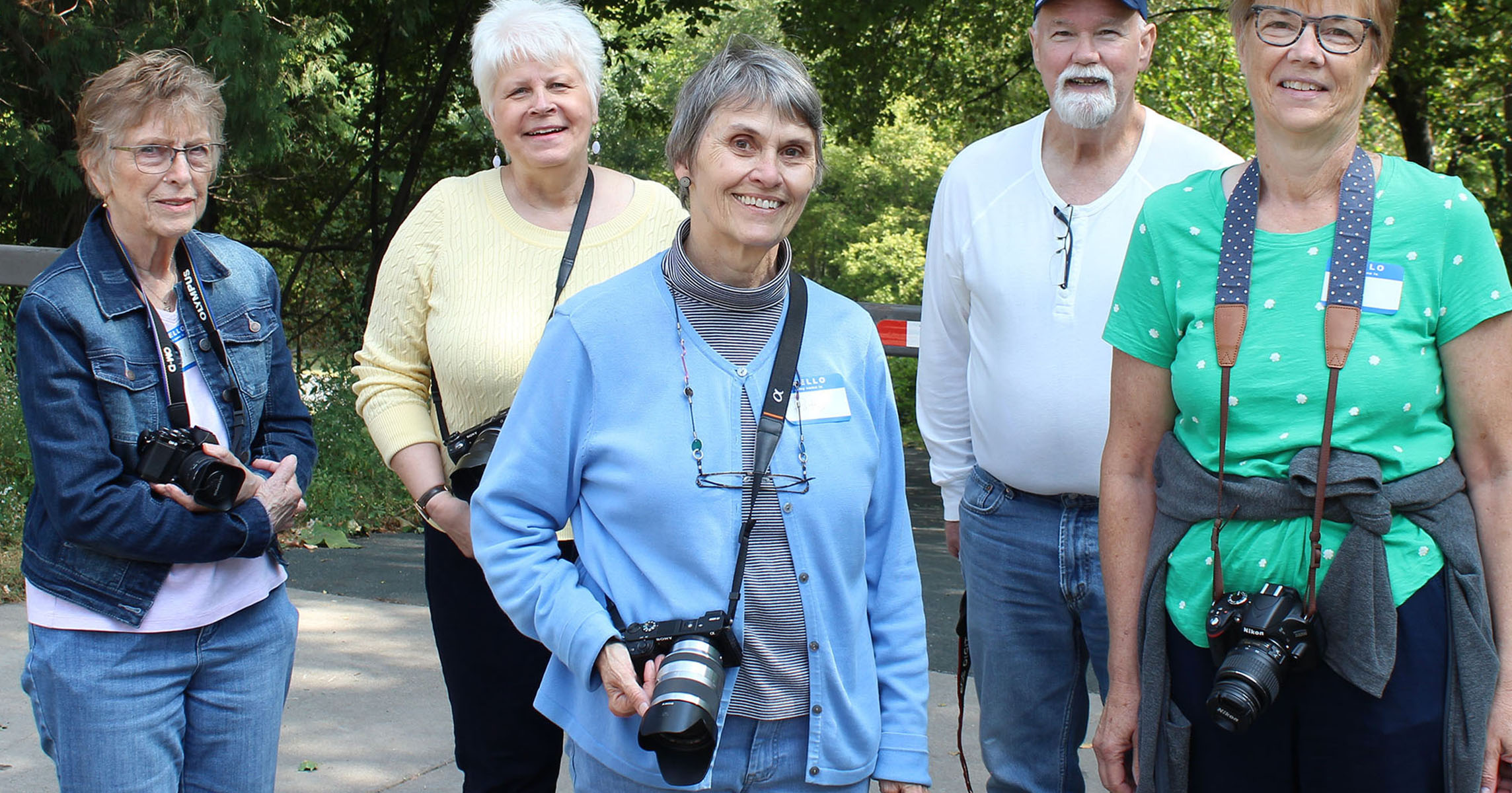 People carrying cameras