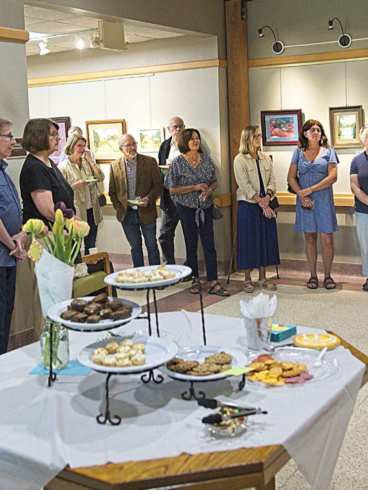 People at an art gallery reception