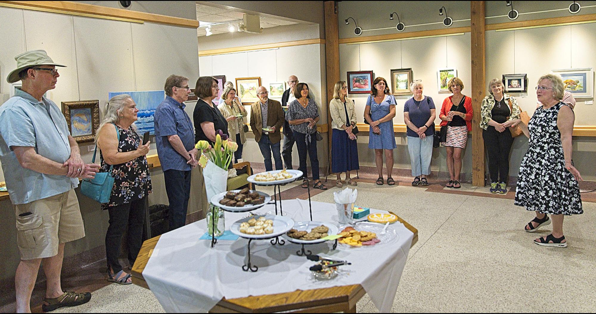 People at an art gallery reception
